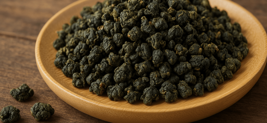 Fresh Gao Shan Oolong tea leaves in traditional Taiwanese bamboo basket